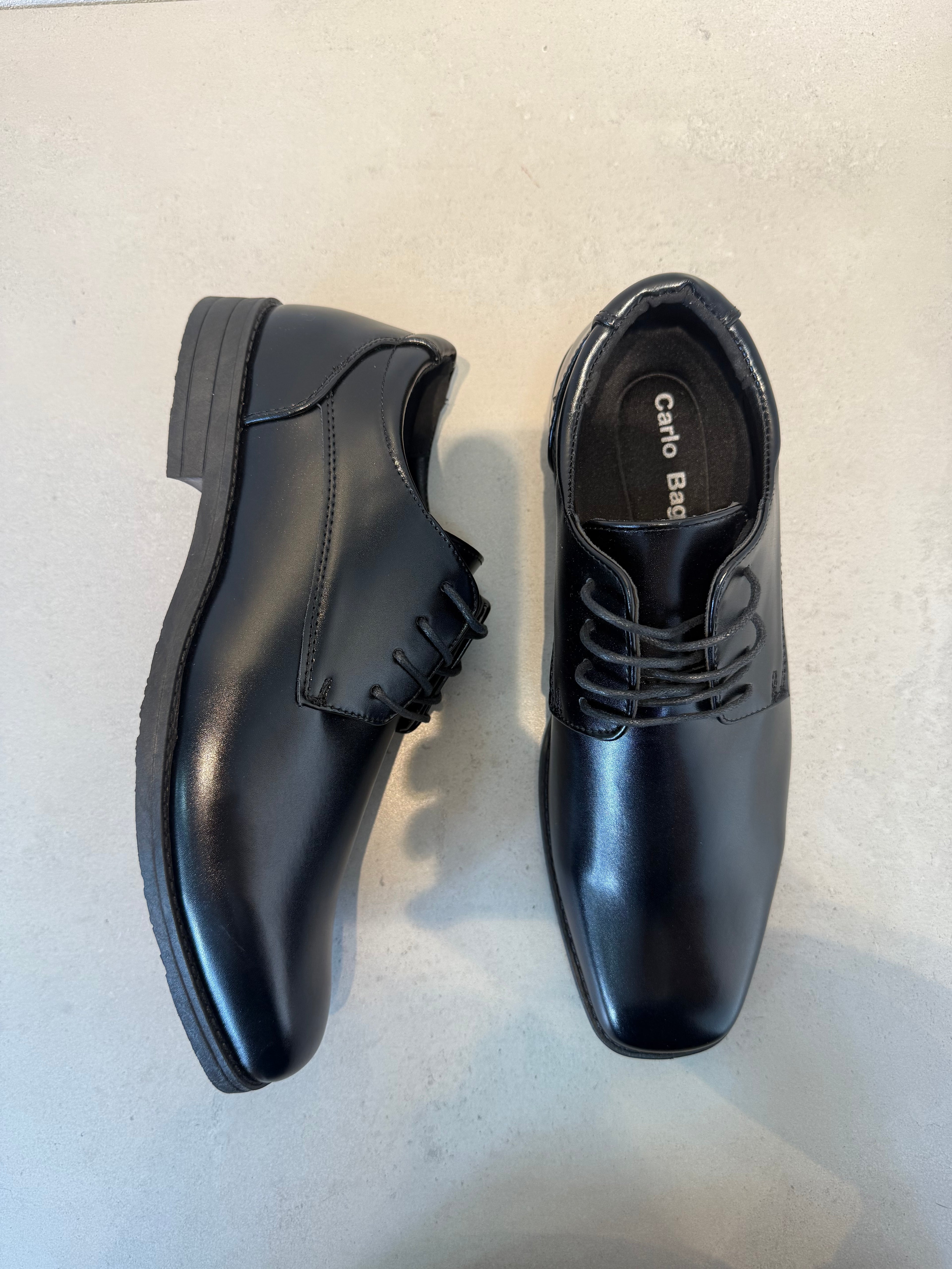 Zapato Casual De Piel Negra Con Cordones Y Suela De Caucho, Acabado Liso Que Realza La Textura De La Piel – 14100