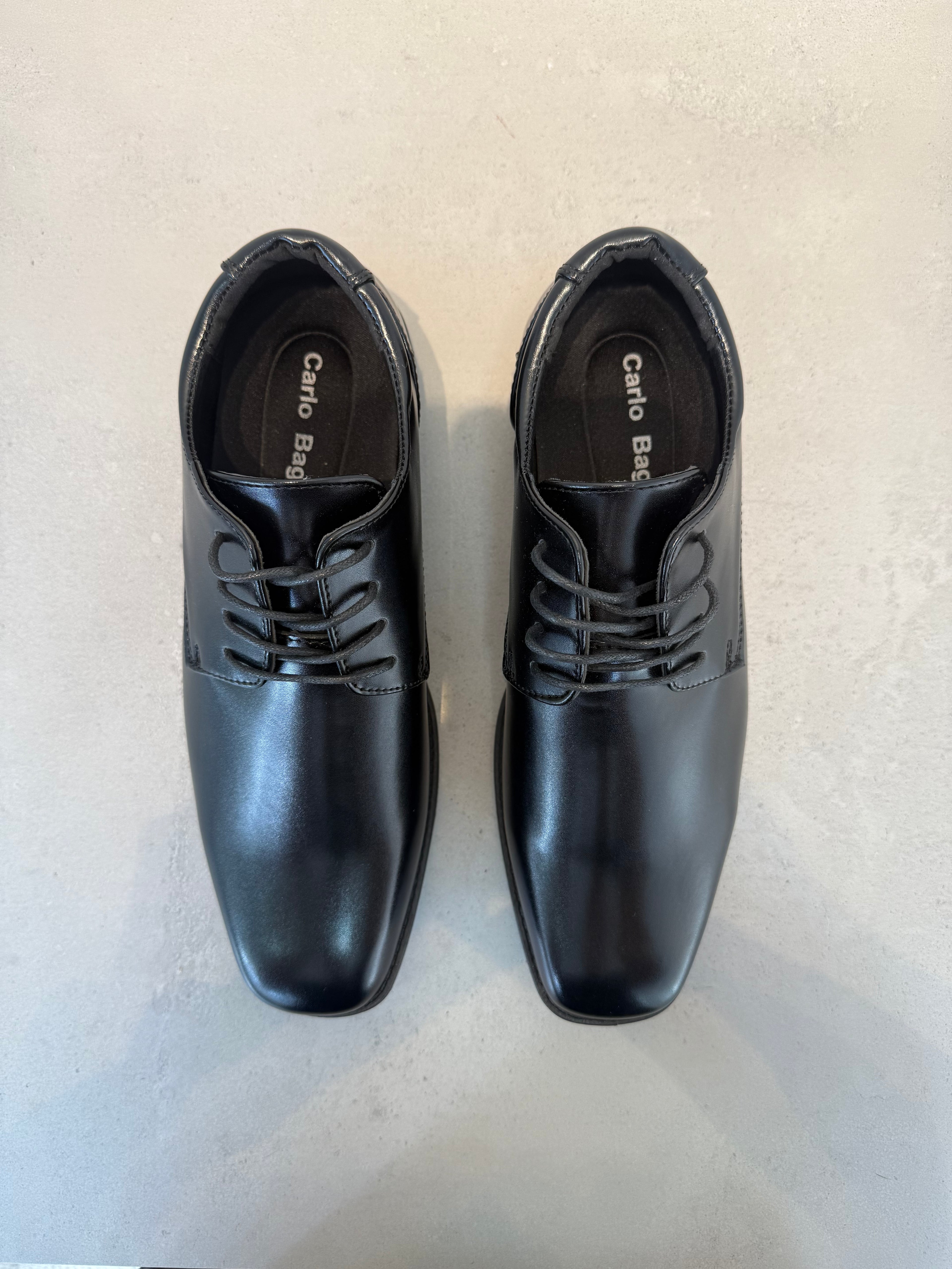 Zapato Casual De Piel Negra Con Cordones Y Suela De Caucho, Acabado Liso Que Realza La Textura De La Piel – 14100